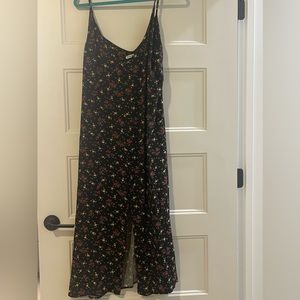 Reformation black midi dress with floral detail and slit